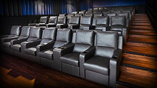 Interior photo of Waterloo RMC Stadium Suites theater with upgraded luxury seating